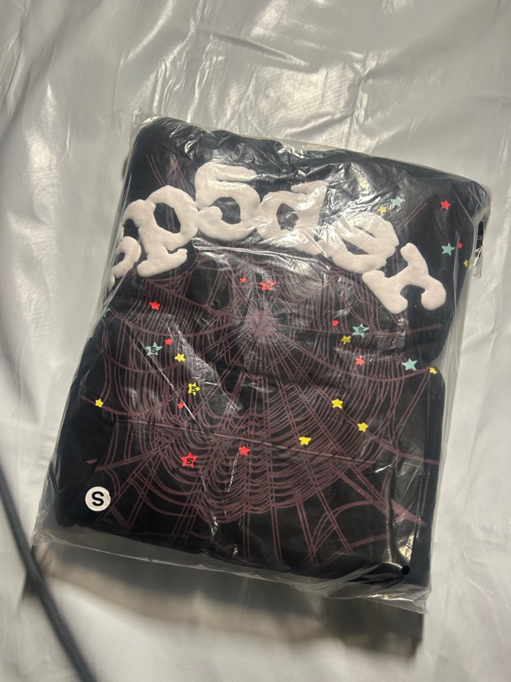 Spyder Black Cardigan with White Logo and Multicolor Star Accents